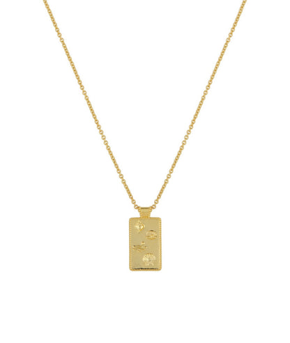 Serene Scenes The Label 18K gold-filled Under The Sea Necklace. Gold chain with rectangular pendant featuring shell designs.